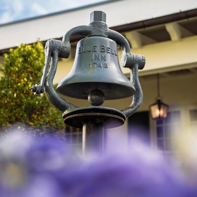 Decorative bell with restaurant name engraved.