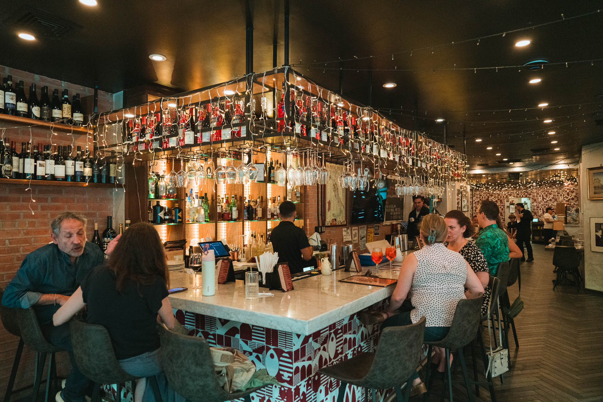 Bar with bottles of alcohol on display