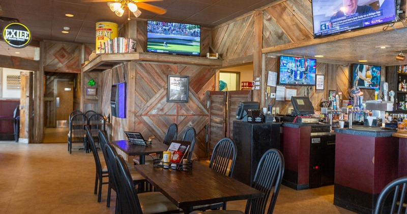 Interior, tables by the bar