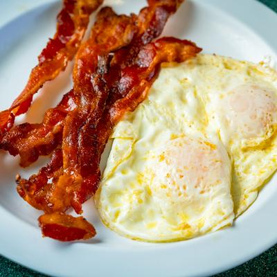 Fried eggs and bacon.