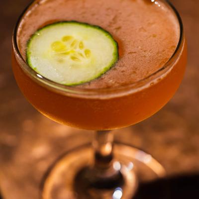 Gin and Aperol cocktail, with cucumber.