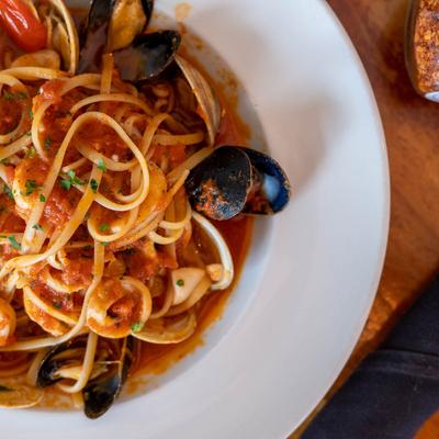Linguine with shrimp, clams, mussels, and calamari tossed in marinara sauce