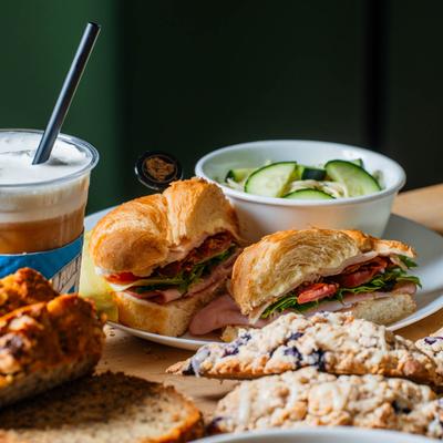 Various foods and drinks on the table.