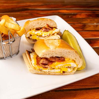 Bacon, eggs, and cheese sandwich, side view.