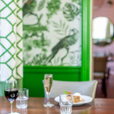Interior, drink glasses on a table in a dining room