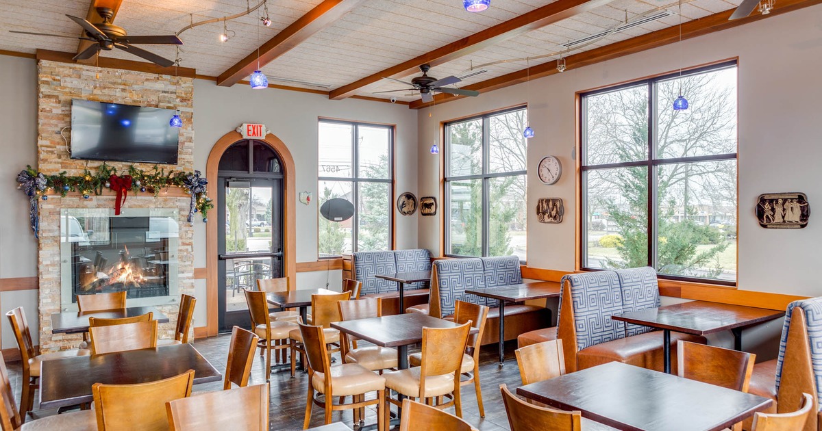 View of a dining area with a fireplace