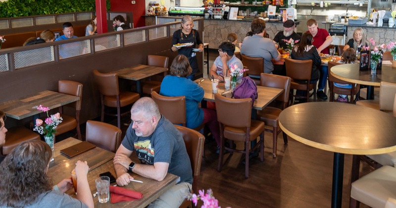 Interior space, dining area full of guests