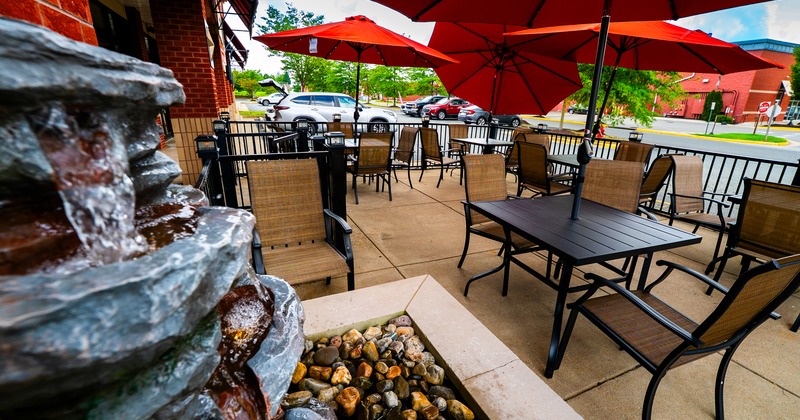 Exterior, patio, parasols, tables, chairs