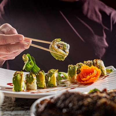 Eel sushi rolls, with cucumber, avocado, and eel sauce.
