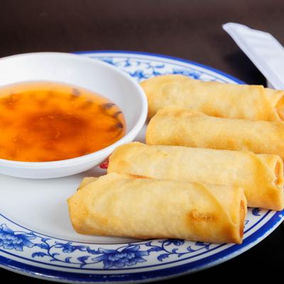 Spring rolls served with sweet chili sauce.