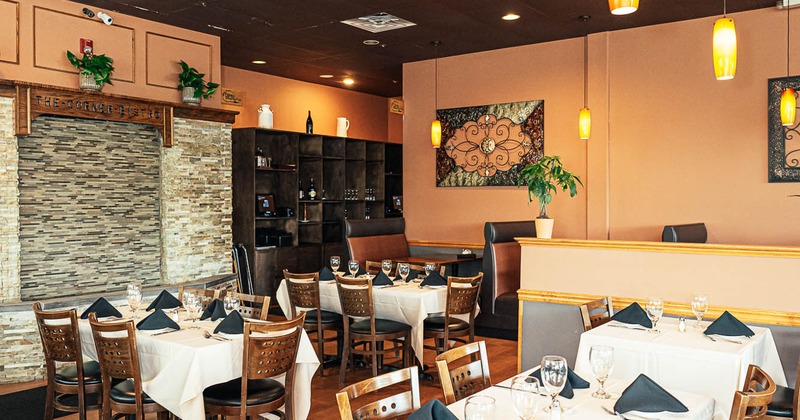 Interior, tables and chairs in dining area