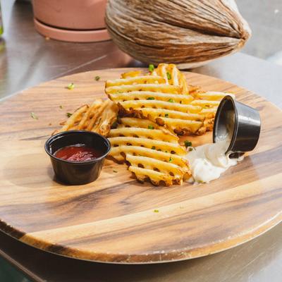 Clockwise Fries served with sauces.