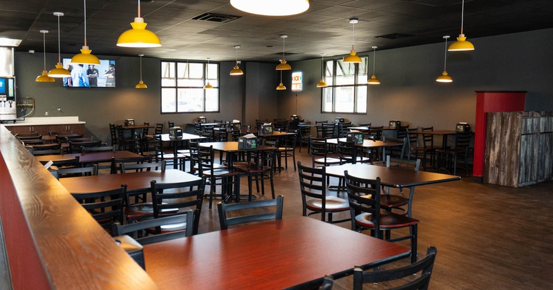 Interior, seating area with tables and chairs