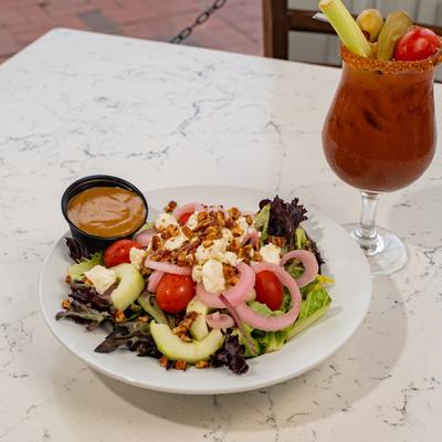 The house salad and a Bloody Mary.