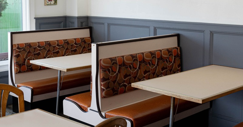 Interior, booths all lined up and ready for guests