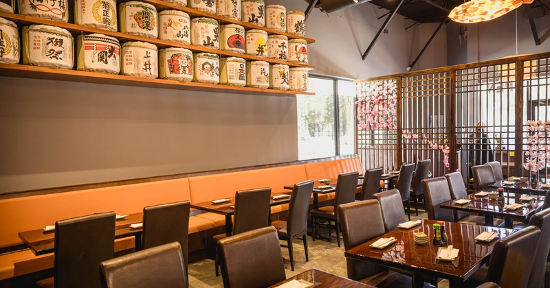 Interior, dining area, long banquette bench with tables and chairs, regular tables for four