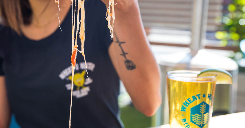 Guest enjoying a pizza