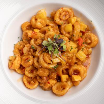 Thai Calamari garnished with micro greens.