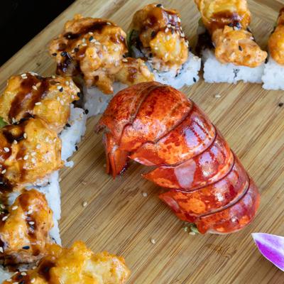 Lobster tail, and lobster tempura sushi rolls.