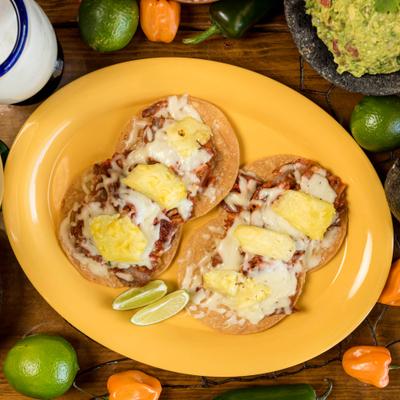 Crispy corn tortillas with steak and melted cheese