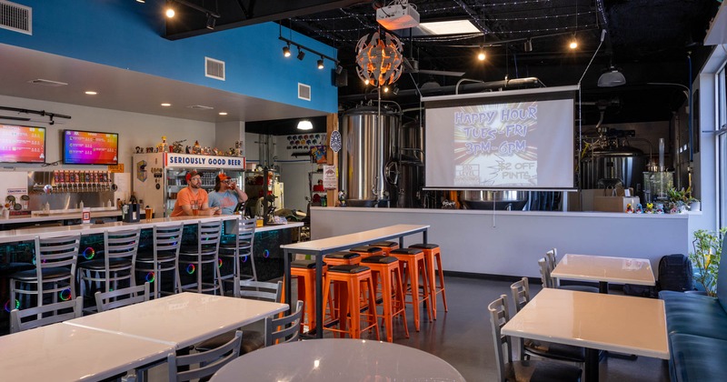 Ross and Clint, the owners, hanging out behind the bar before opening for the day.