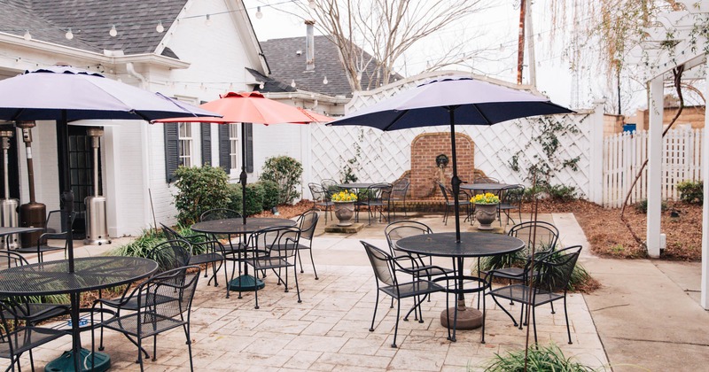 Exterior, patio with tables and chairs