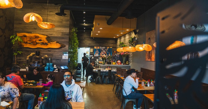 Interior, tables and chairs, guests sitting and enjoying their food and drinks