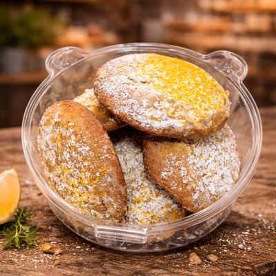 Cookies topped with powdered sugar.