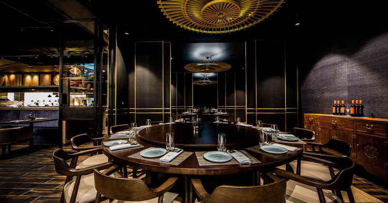 Interior, dining round tables with tableware