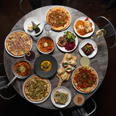 Different food dishes served on the table, top view.