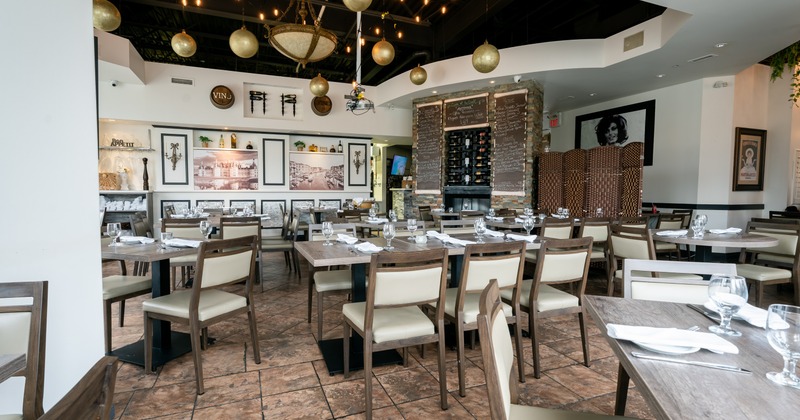 Interior, bright and vibrant dining area, with art on the walls
