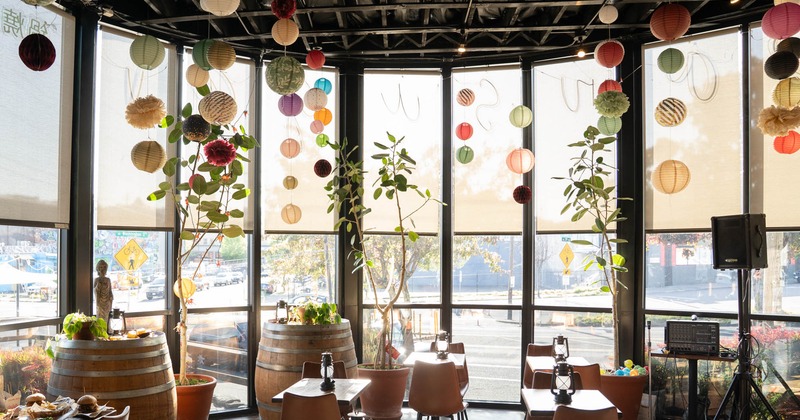 Interior seating area with chairs and tables, colorful decoration