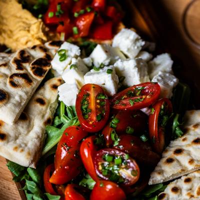 Sweet potato hummus, olive spread, roasted red peppers, feta cheese, and pita.