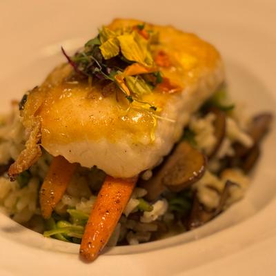 Halibut with mushroom risotto & citrus beurre blanc.