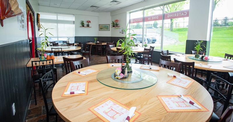 Interior, round tables and chairs ready for guests