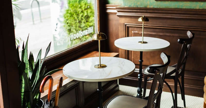 Interior, tables and chairs ready for guests