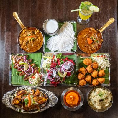 An assortment of dishes arranged on a table, top view.