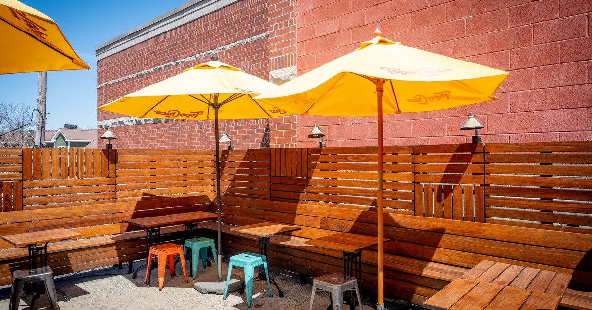 Exterior, patio, tables, chairs, parasols