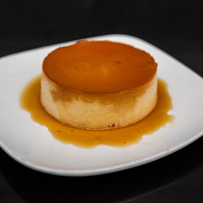 Cheesecake flan topped with caramel sauce.