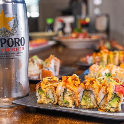 Sushi rolls and beer.