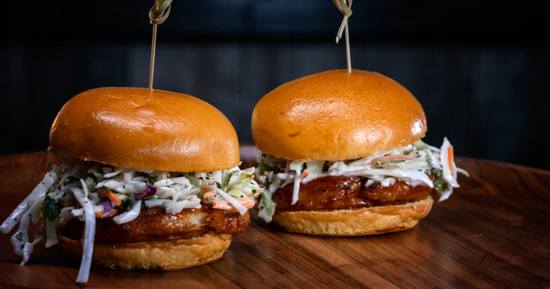 2 Pork Sliders with cole slaw topping on brioche buns
