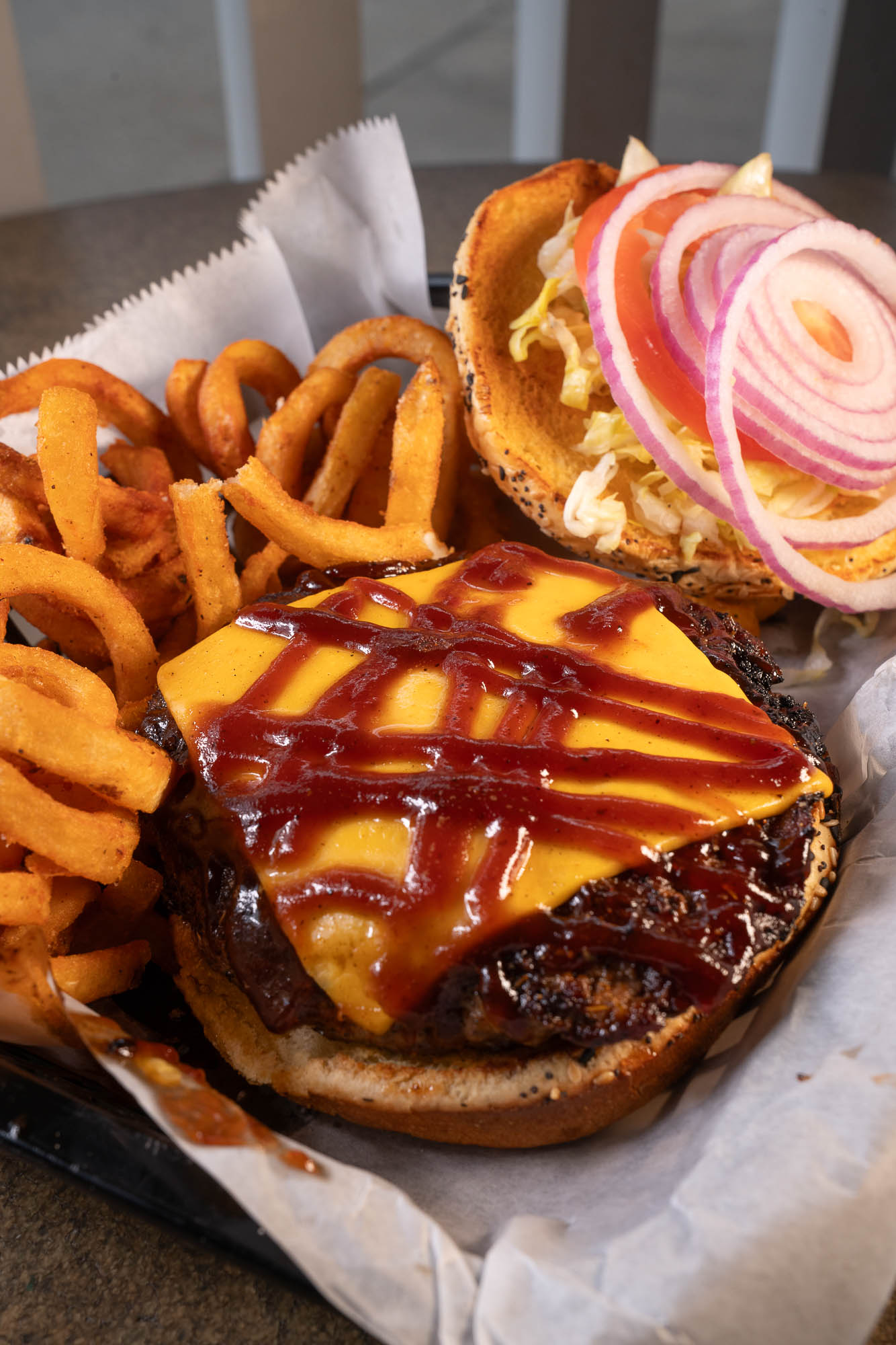 Cajun BBQ Burger with a side of fries