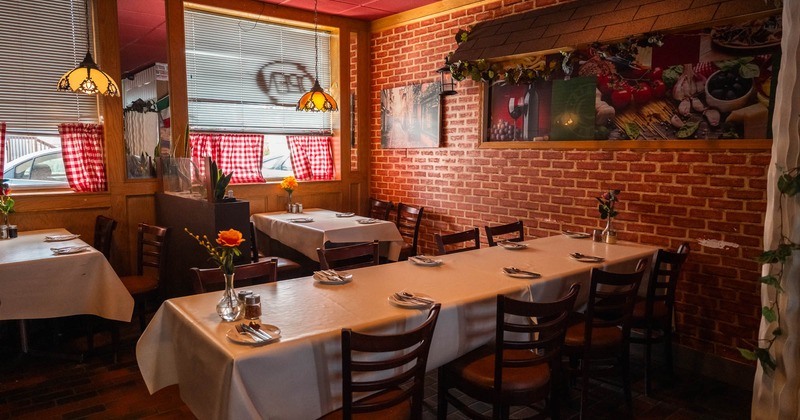 Interior, tables and chairs in dining area