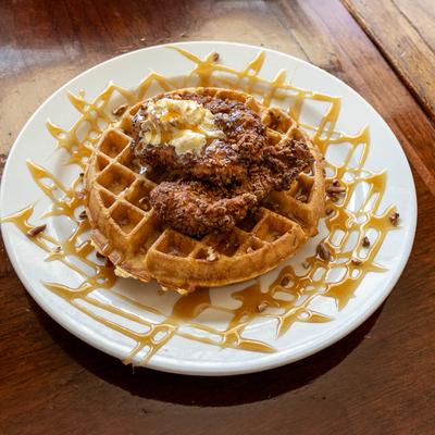 Southern Fried Chicken & Waffle with whipped honey butter and pecans.