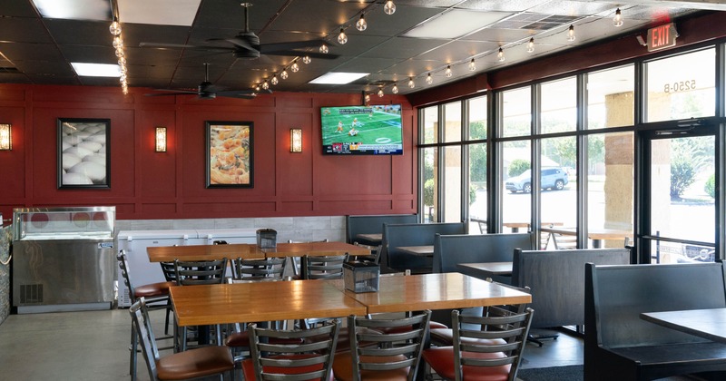 Interior, tables and chairs ready for guests
