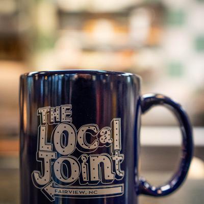 Coffee mug with the company logo.