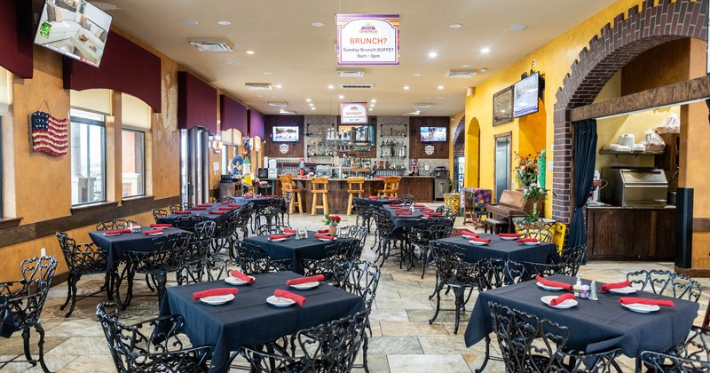 Interior, seating area with a bar in the back