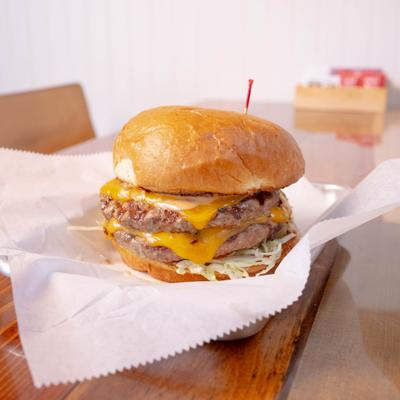 Served burger in the table.