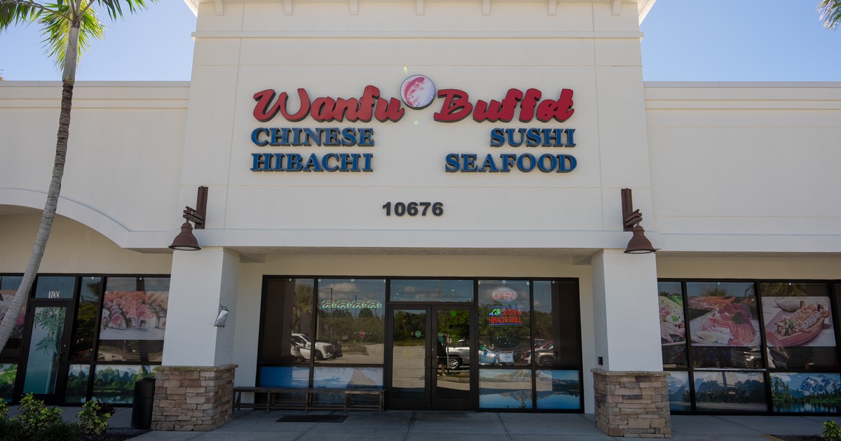 Exterior, front view to restaurant, entrance, sign above