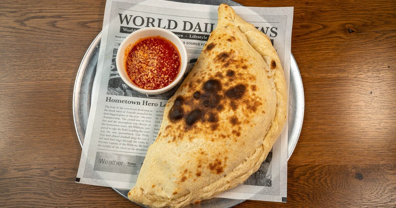 Stromboli and tomato sauce